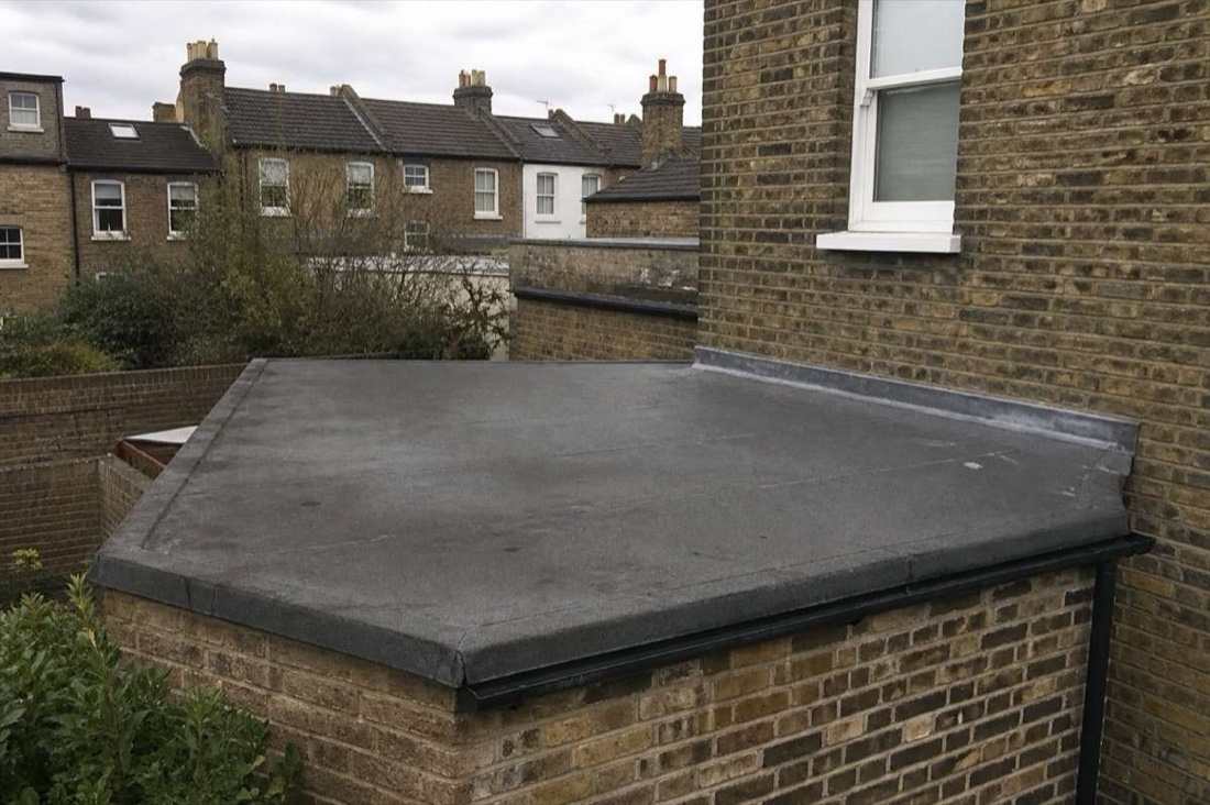 Flat roof on a London brick extension